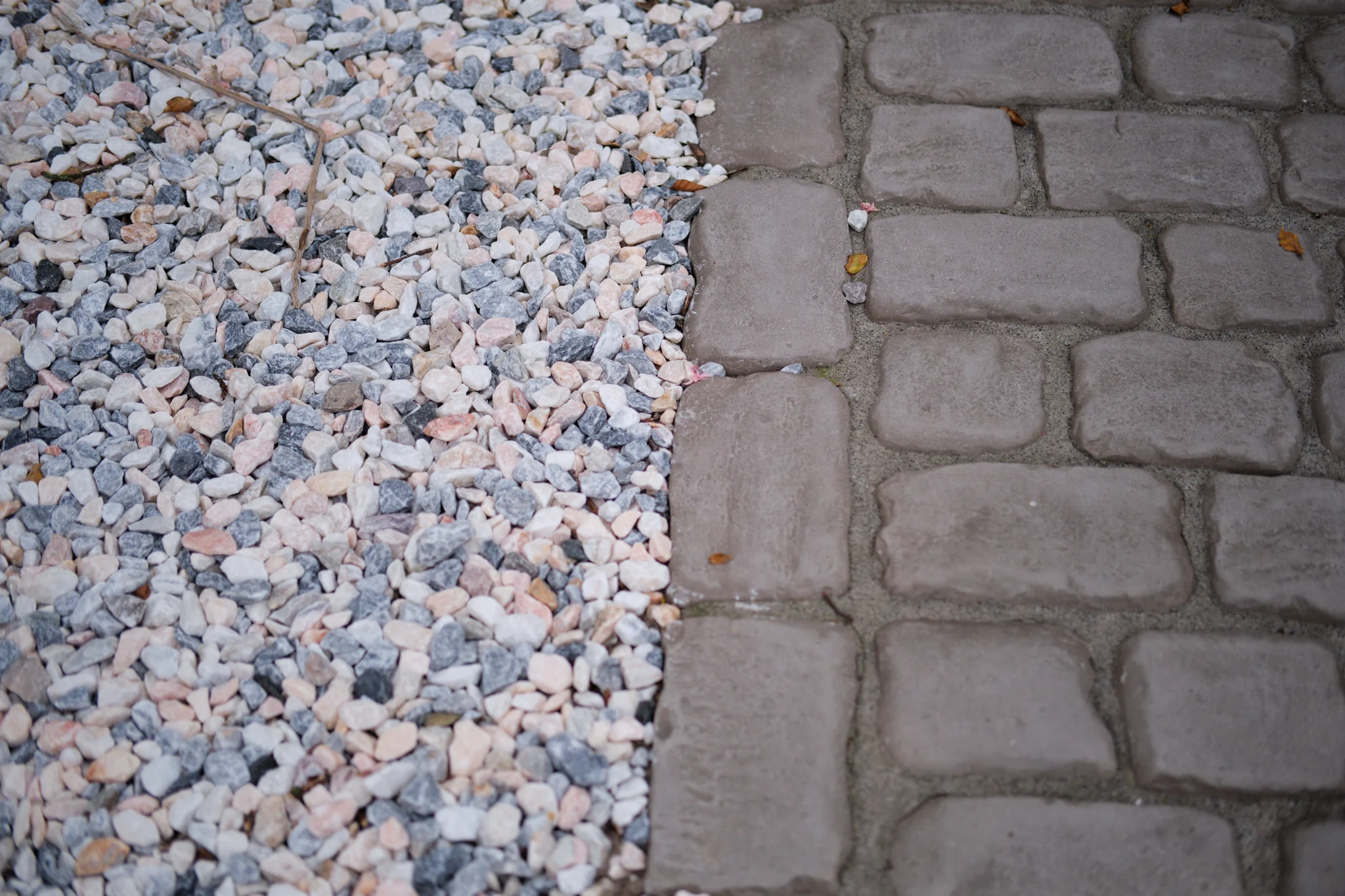 Detail materiaalovergang grind en klinkers